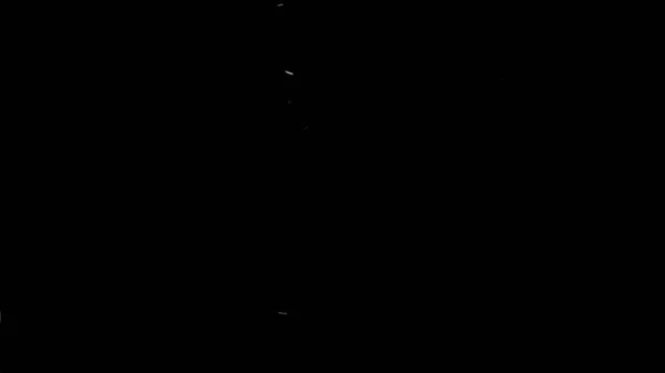 Gece Gökyüzünde Büyük Ateş 'ten yükselen güzel, yakıcı kıvılcımlar. Kara Arkaplan Yavaş Hareketindeki Soyut İzole Ateş Parlayan Parçacıkları. Döngülü 3D animasyon. Hareket eden taraf. 4k Ultra HD 3840x2160.