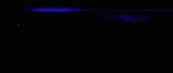高密蓝色光学透镜的闪光过渡是一个无缝的循环与自然的无定形蓝色照明 4K伟大的运动图形 — 图库照片
