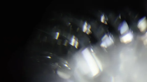 Karanlıkta 4k Soyut Kristal Bokeh. Düzenleme için arkaplanı üst üste koy. Işık Sızıntısı 4K görüntüsü