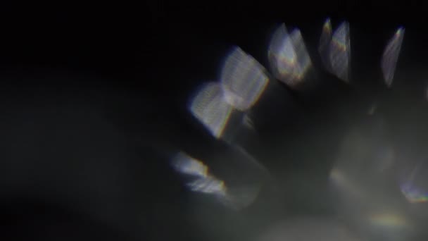 4k Abstract kristal bokeh in het donker. Overlay achtergrond voor het bewerken. Luminaire lichtlekken — Stockvideo