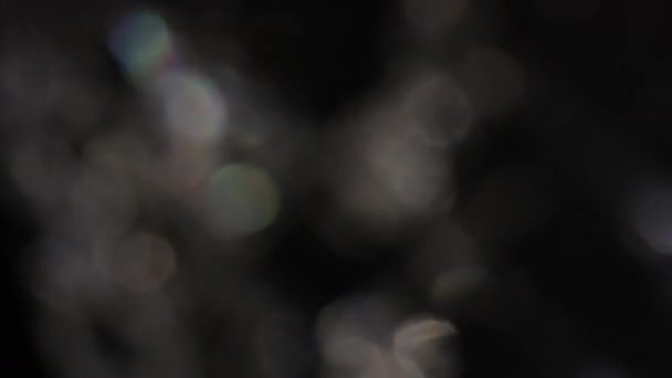 4k Abstract kristal bokeh in het donker. Overlay achtergrond voor het bewerken. Luminaire lichtlekken — Stockvideo