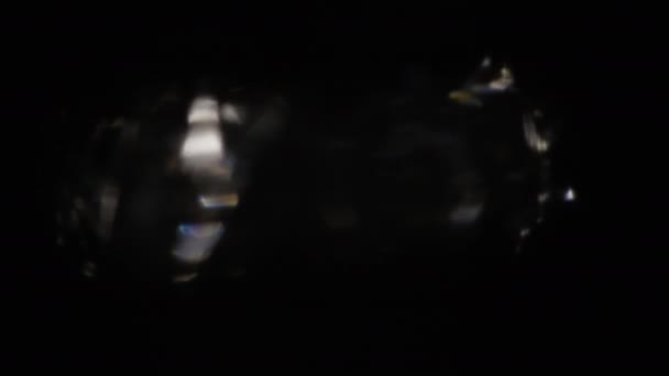 4k Abstrakt kristall bokeh i mörkret. Overlay bakgrund för redigering. Ljusläckor från belysning — Stockvideo