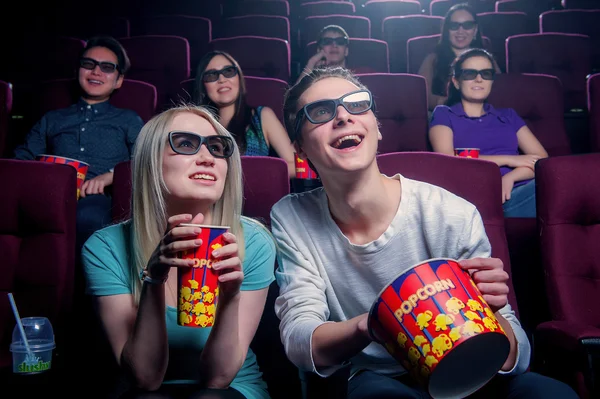 People in the cinema wearing 3d glasses Stock Image