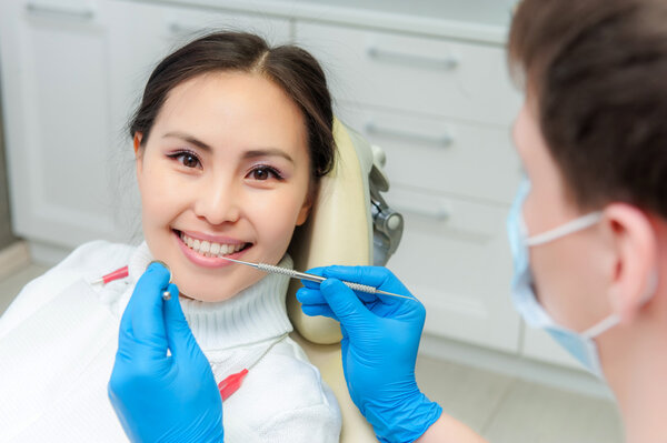 Young female patient at dentist office