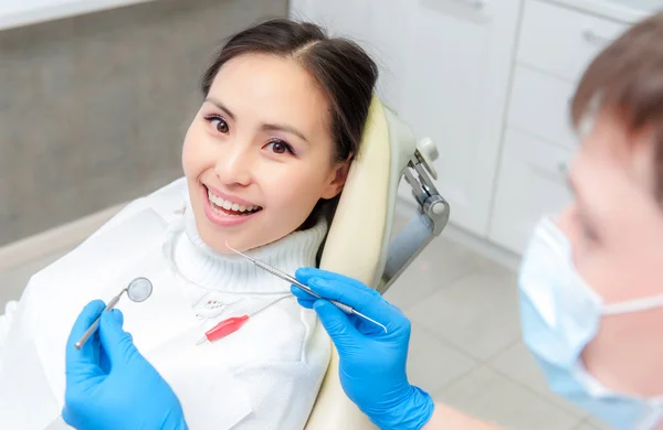 Young female patient at dentist office — Stock Photo, Image