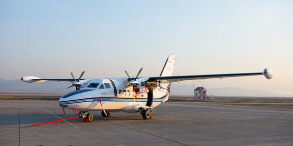 Ulan-Ude, Russia - April 22, 2014: New white Let 410 airplane parked at the airport Baikal — Stock Photo, Image