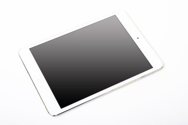 Beyaz arka plan üzerinde döşeme beyaz tablet