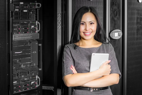 Engineer businesswoman in network server room — Stock Photo, Image