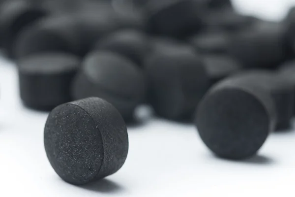 Activated carbon pills — Stock Photo, Image