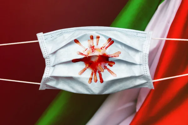 protective face mask against italian flag - pandemic covid 19 Coronavirus concept in Italy
