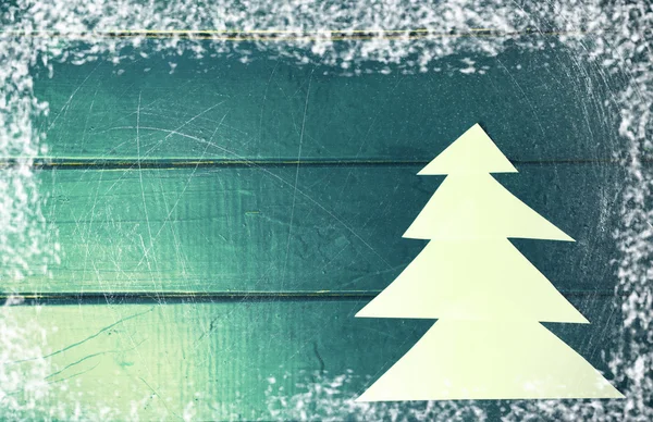 Papper julgran på blå trä bakgrund. Gott Nytt År — Stockfoto