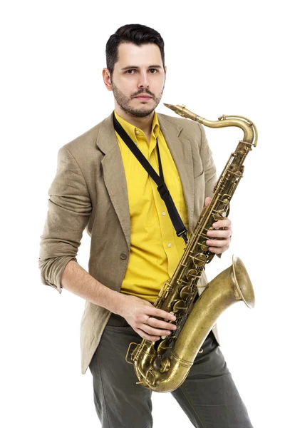 Hombre saxofonista tocando saxofonista en estudio aislado en blanco — Foto de Stock