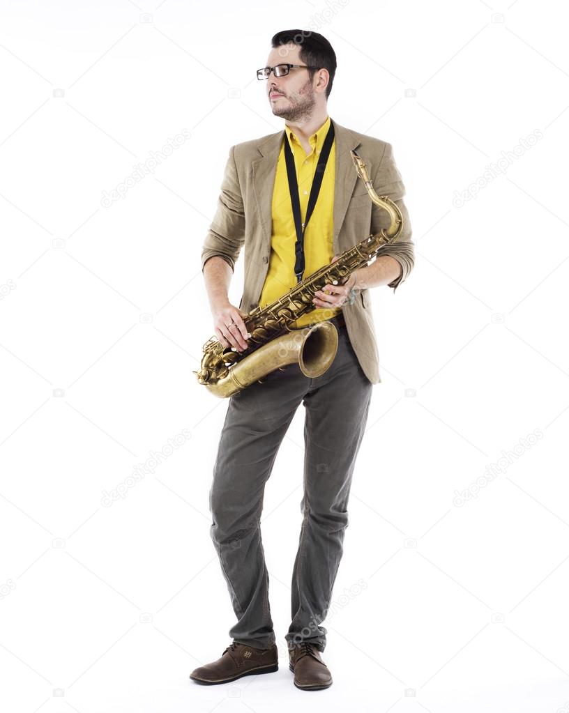 saxophone player in yellow t-shirt and bowtie . guy playing the 