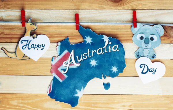 Australian maps flag, kangaroos and koala, hanging pegs.  Austra — Stock Fotó