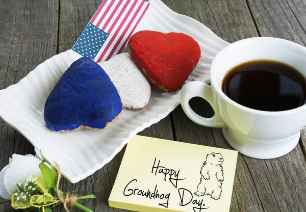 Heart shaped cookies color red, blue, white. Cup of coffee (tea) — Stock Photo, Image