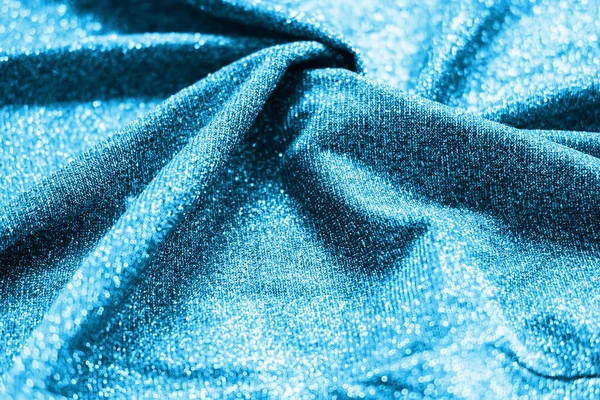 Színes kék fényes szövet textúra redőkkel. Felület háttér színek az év 2021. — Stock Fotó