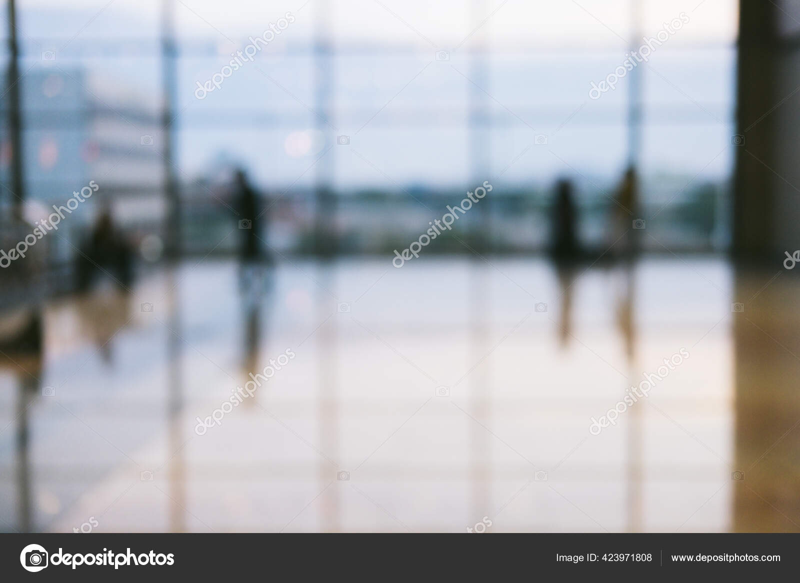 Bright defocused blurred background with unrecognizable people at the  airport. Abstract image of crowd of people in public place. Stock Photo by  ©TumanaNet 423971808