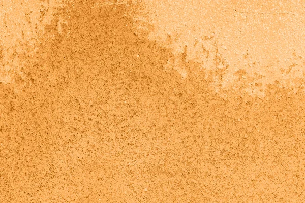 Beton orange bunte Wandoberfläche Textur. Abstrakte Grunge helle Ringelblumen Hintergrund mit Alterungseffekt. Kopierraum. Trendfarbe des Jahres 2021. — Stockfoto