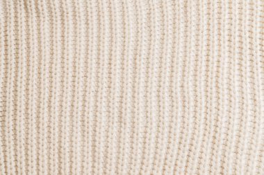 Yünlü örülmüş kumaş. Arka plan kıvrımlı. Tekstil.