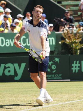 Jack Sock serving
