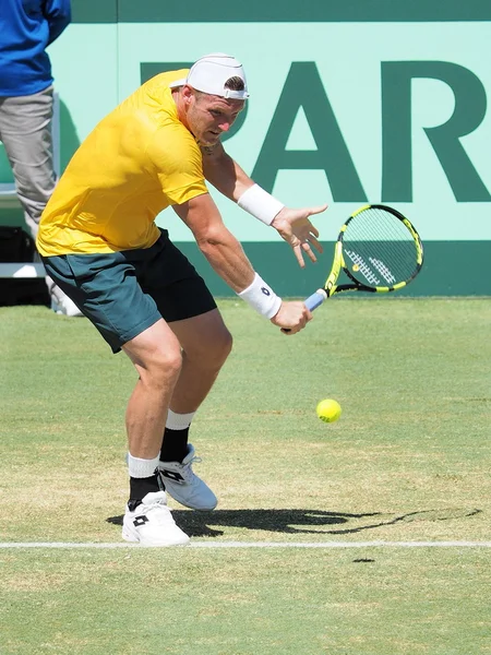 Australian Tennis player Sam Groth slice backhand — Stockfoto