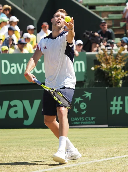 Jack Sock serving at a Davis Cup match — Stock Photo, Image