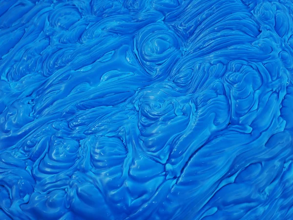 Blue polymer mass with a wavey, dough or mud like structure — ストック写真