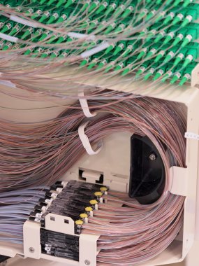 Ribbon to fiber transition in the back of a 576f Distribution Hub Panel clipart