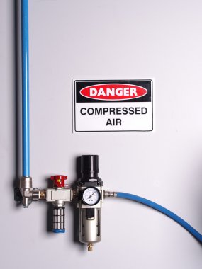 Fixed color coded compressed air line with pressure regulator clipart