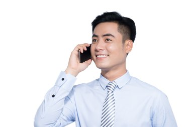 İş adamı telefonda konuşuyor.  