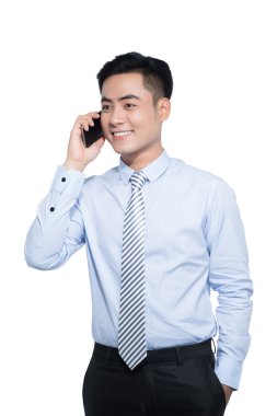 İş adamı telefonda konuşuyor.  