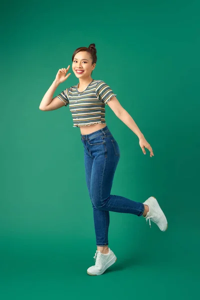 Full Length Portrait Happy Young Woman Dancing Green Background — Stock Photo, Image