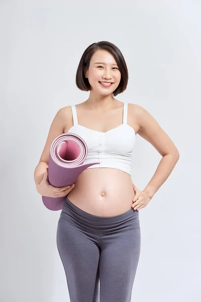 Mladá Atraktivní Těhotná Žena Dotýkající Jejího Břicha Při Držení Jógy — Stock fotografie