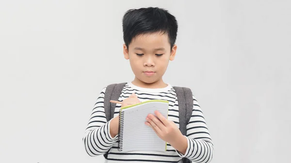 Retrato Menino Engraçado Segurando Livro Sobre Fundo Branco — Fotografia de Stock