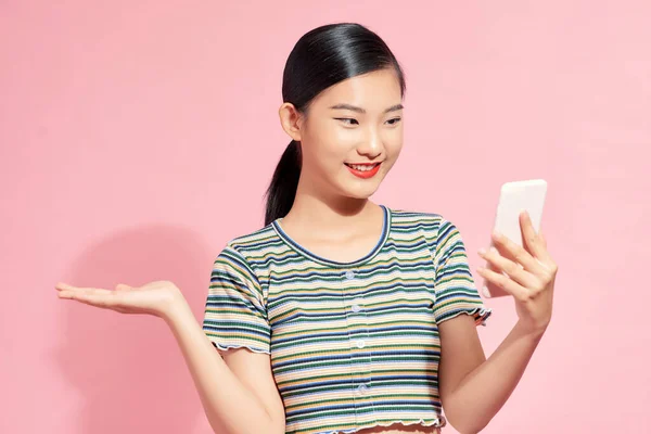 Happy Girl Mobile Phone Holding Presenting Something Imaginary Open Hand — Stock fotografie