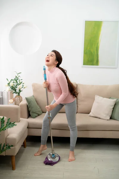 Happy Asian Woman Headphones Mop Bucket Cleaning Floor Singing Home — Stock Photo, Image