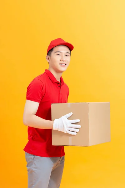 Happy Delivery Man Box Isolated Yellow Background — Stock Photo, Image