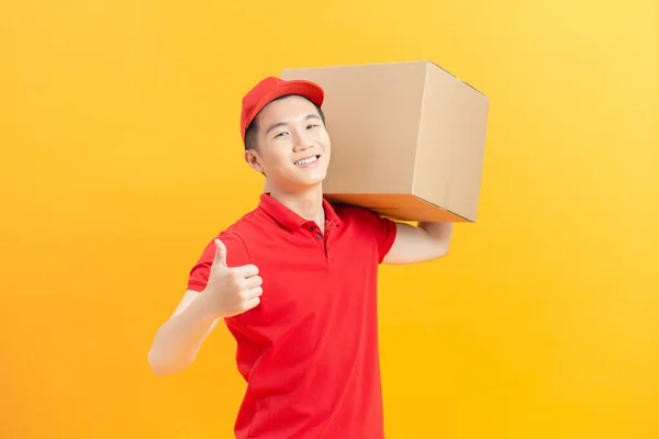 Delivery Concept Happy Delivery Man Holding Box Package Showing Things — Φωτογραφία Αρχείου