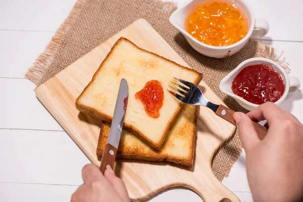 Woman Hands Eating Bread Strawberry Jam Breakfast Focus Hands — Stock Photo, Image