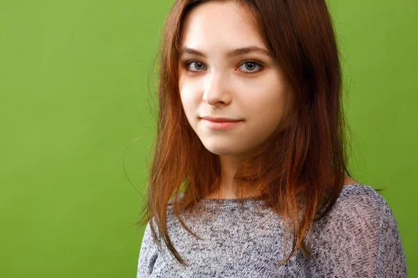 Teenage girl on green background — Stock Photo, Image