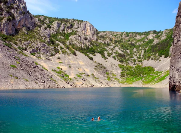 Swimming in the Blue Lake in Croatia. — Stock Photo, Image