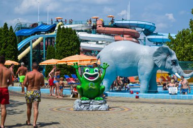 Hungary, Hajduszoboszlo - August 1, 2019: Vacationers near the water park and water slides of the thermal spa resort complex Hajduszoboszlo.