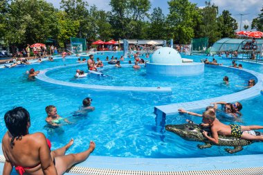 Hungary, Hajduszoboszlo - August 1, 2019: Vacationers in the entertainment pool of the thermal spa resort complex Hajduszoboszlo.