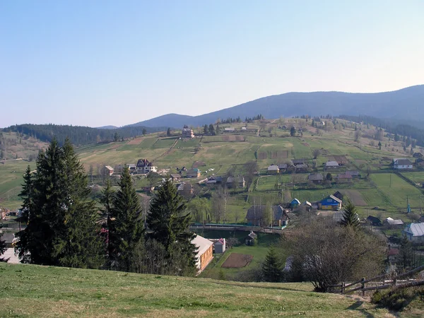 Mountain village in the spring. — Stock Photo, Image