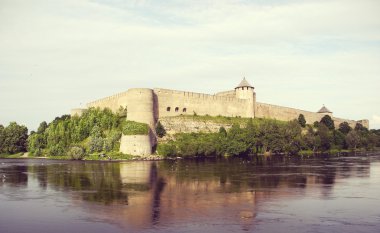 Ivangorod Fortress on the Russian bank of the Narva River. clipart
