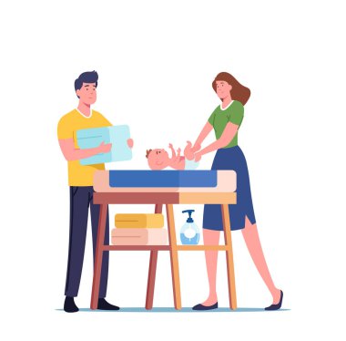Genç Ebeveynler Çocuk Masasında Çocuk Bezi Değiştirme, Mutlu Baba ve Anne Çocuğa Bakıyor