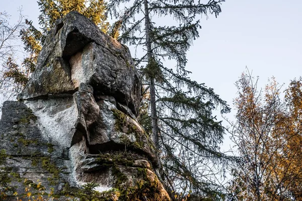 Mystical rock group and stone group Teufelsstein near the Teufelsmuehle near Rattenberg with the rock face a face or grimace of a devil\'s face natural origin and natural phenomenon, Bavarian Forest