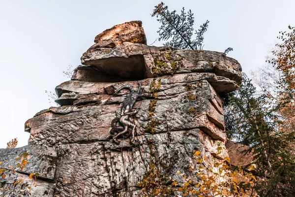 Mystical rock group and stone group Teufelsstein near the Teufelsmuehle near Rattenberg with the rock face a face or grimace of a devil\'s face natural origin and natural phenomenon, Bavarian Forest