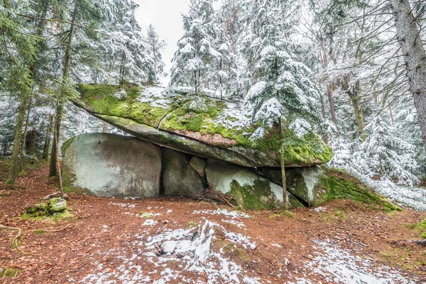 Space ship rock near Thurmansbang megalith granite rock formation in winter in bavarian forest, Germany