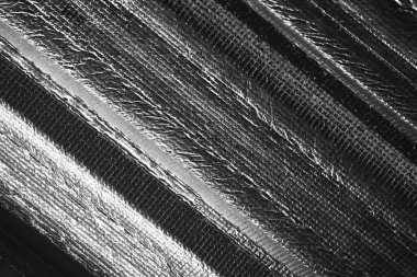 Güzel diyagonal çizgili modern soyut arkaplan. Bu siyah beyaz makro detay endüstriyel dokuma dokusunu gösteriyor, gelişmiş geometrik bir his yaratıyor.